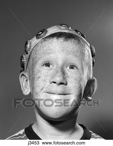 1950S Portrait Of Smiling Freckled Teen Boy Wearing Bottle Cap Beanie Hat View Large Photo Image Stock Image - 1950S Portrait Of Smiling Freckled Teen Boy Wearing Bottle Cap Beanie Hat . Fotosearch