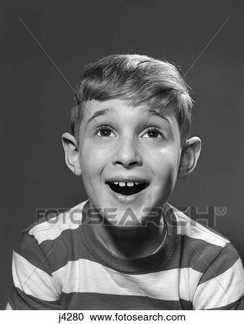 1950S Portrait Smiling Boy Looking Up View Large Photo Image Stock Image - 1950S Portrait Smiling Boy Looking Up . Fotosearch