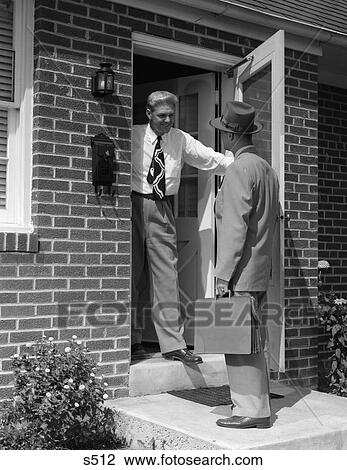1950S Salesman Talking To Man At Front Door View Large Photo Image Stock Image - 1950S Salesman Talking To Man At Front Door . Fotosearch