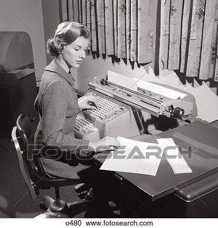 1950S Secretary Sitting At Desk Reading From Ledger Making Entries On Comptometer View Large Photo Image Stock Image - 1950S Secretary Sitting At Desk Reading From Ledger Making Entries On Comptometer . Fotosearch