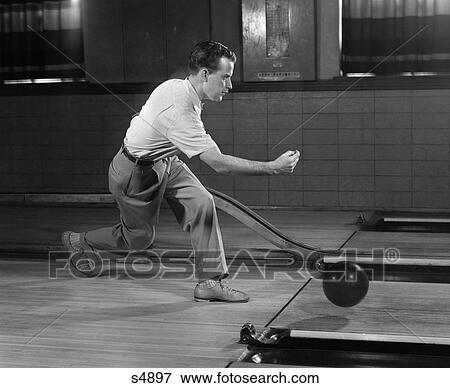 Stock Photo - 1950S Side View Man Bowling . Fotosearch