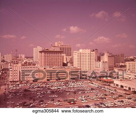 1950S Skyline Of Southern American City Parking Lot In Foreground View Large Photo Image Picture - 1950S Skyline Of Southern American City Parking Lot In Foreground. Fotosearch