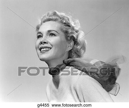 1950S Smiling Blonde Woman 3/4 Profile Portrait Scarf Neck Wind Blown View Large Photo Image Stock Photography - 1950S Smiling Blonde Woman 3/4 Profile Portrait Scarf Neck Wind Blown . Fotosearch