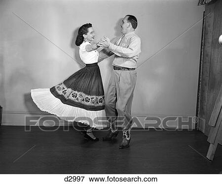 1950S Smiling Couple Wearing Country Western Clothes Square Dancing View Large Photo Image Stock Photo - 1950S Smiling Couple Wearing Country Western Clothes Square Dancing. Fotosearch