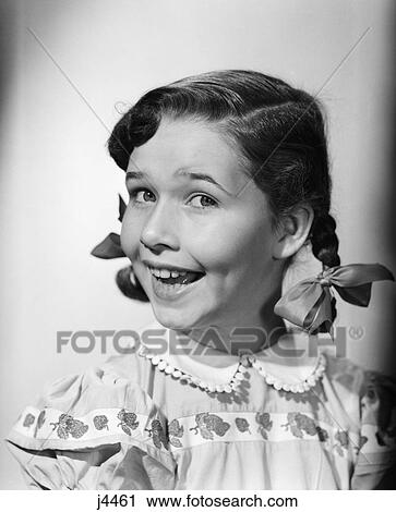 1950S Smiling Girl Pigtails Ribbon Bow Funny Face 3 4 Profile Portrait View Large Photo Image Stock Image - 1950S Smiling Girl Pigtails Ribbon Bow Funny Face 3 4 Profile Portrait . Fotosearch