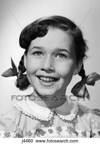 1950S Smiling Happy Girl Pigtails With Ribbon Bows View Large Photo Image Stock Image - 1950S Smiling Happy Girl Pigtails With Ribbon Bows . Fotosearch