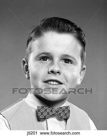 1950S Smiling Portrait Brunette Boy Wearing Checkered Vest Polka Dot Bow Tie View Large Photo Image Stock Image - 1950S Smiling Portrait Brunette Boy Wearing Checkered Vest Polka Dot Bow Tie . Fotosearch
