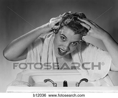 1950S Smiling Woman Washing Shampoo Hair In Sink View Large Photo Image Stock Photograph - 1950S Smiling Woman Washing Shampoo Hair In Sink . Fotosearch