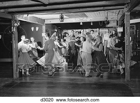 1950S Square Dancers In Country Western Outfits Dancing To The Music Of A Small Band In A Barn View Large Photo Image Stock Image - 1950S Square Dancers In Country Western Outfits Dancing To The Music Of A Small Band In A Barn . Fotosearch