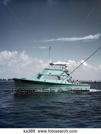 1950S Turquoise Green Fishing Boat On Ocean People Man Woman Fishing Off Stern Florida Offshore Deep Sea Salt Water View Large Photo Image Stock Photo - 1950S Turquoise Green Fishing Boat On Ocean People Man Woman Fishing Off Stern Florida Offshore Deep Sea Salt Water. Fotosearch