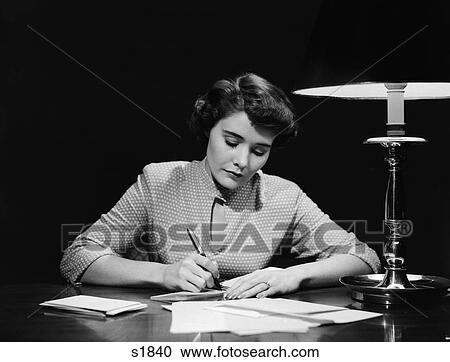 1950S Woman At Desk Writing Check Pen Lamp Finance Paying Bills Budget View Large Photo Image Stock Image - 1950S Woman At Desk Writing Check Pen Lamp Finance Paying Bills Budget . Fotosearch