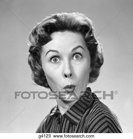 1950S Woman Making Funny Face Eyes Wide Lips Pursed As In A Kiss Or A Whistle View Large Photo Image Stock Image - 1950S Woman Making Funny Face Eyes Wide Lips Pursed As In A Kiss Or A Whistle. Fotosearch