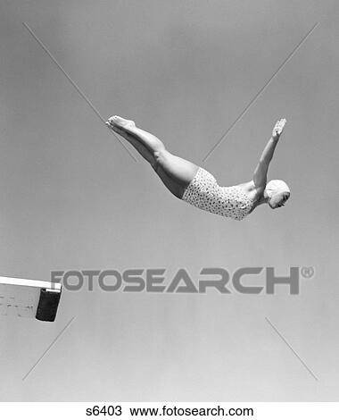 1950S Woman Swan Dive Off Diving Board One Piece Bathing Suit Cap View Large Photo Image Stock Image - 1950S Woman Swan Dive Off Diving Board One Piece Bathing Suit Cap . Fotosearch