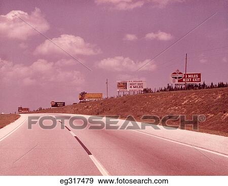 Stock Photo - 1960S Empty Highway With Billboards. Fotosearch