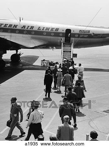 Stock Photography - Airplane Boarding Passengers Ladder 1950 1950S 1960S 1960 Retro. Fotosearch