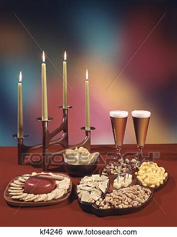 Glasses Beer, Cheese Crackers Assorted Snacks Serving Dishes With Candles On Table View Large Photo Image Stock Photograph - Glasses Beer, Cheese Crackers Assorted Snacks Serving Dishes With Candles On Table. Fotosearch