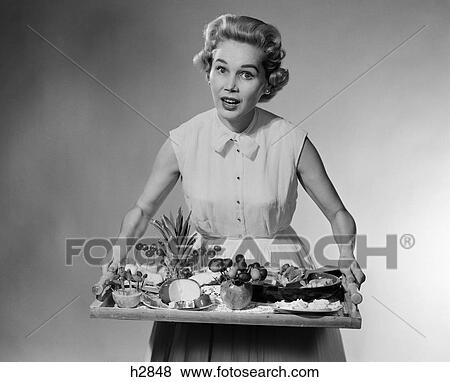 Woman Platter Horsdeuvres Snacks Retro 1950S View Large Photo Image Stock Photo - Woman Platter Horsdeuvres Snacks Retro 1950S. Fotosearch