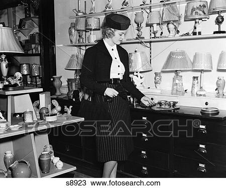 Woman Shopping Lamps Lighting Store 1950 1950S Retro View Large Photo Image Stock Image - Woman Shopping Lamps Lighting Store 1950 1950S Retro. Fotosearch