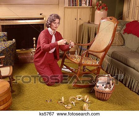 1960 1960S 1970 1970S Senior Middle Aged Woman Caning Seat Chair Hobby Repair Art Crafts Home Improvement Household View Large Photo Image Stock Photo - 1960 1960S 1970 1970S Senior Middle Aged Woman Caning Seat Chair Hobby Repair Art Crafts Home Improvement Household . Fotosearch