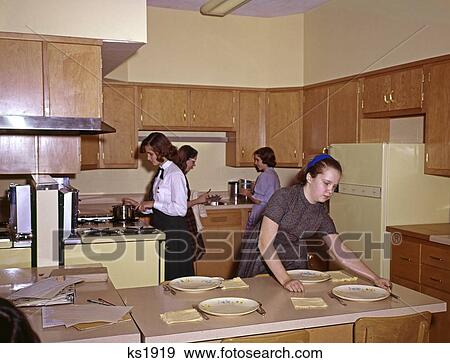 1960 1960S 4 Girls In Kitchen School Home Economics Class Setting Table Cooking Retro View Large Photo Image Stock Photo - 1960 1960S 4 Girls In Kitchen School Home Economics Class Setting Table Cooking Retro. Fotosearch