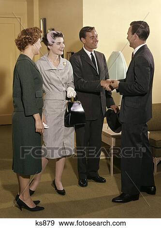 1960 1960S Couples Shaking Hands View Large Photo Image Stock Photo - 1960 1960S Couples Shaking Hands. Fotosearch