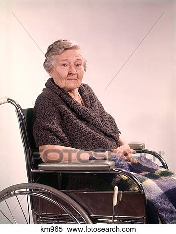 1960 1960S Elderly Senior Mature Woman Sitting Wheelchair Aging Agism Patient Geriatrics View Large Photo Image Stock Photography - 1960 1960S Elderly Senior Mature Woman Sitting Wheelchair Aging Agism Patient Geriatrics . Fotosearch