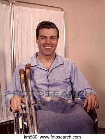 1960 1960S Man Patient Smiling Blue Pajamas Sitting Wheelchair Hospital Screen View Large Photo Image Stock Image - 1960 1960S Man Patient Smiling Blue Pajamas Sitting Wheelchair Hospital Screen . Fotosearch