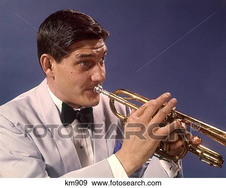 1960 1960S Man Playing Trumpet View Large Photo Image Stock Photo - 1960 1960S Man Playing Trumpet . Fotosearch