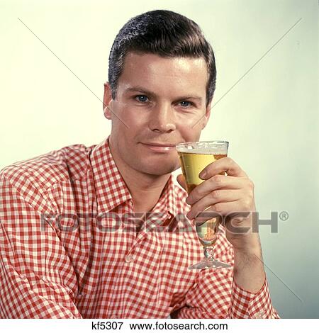 Stock Photo - 1960 1960S Man Red Checked Shirt Drink Drinking Glass Beer . Fotosearch