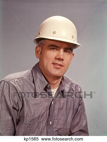 1960 1960S Man Wearing Hard Hat Worker Workers Construction Manual Laborer Safety Hats View Large Photo Image Stock Photography - 1960 1960S Man Wearing Hard Hat Worker Workers Construction Manual Laborer Safety Hats . Fotosearch