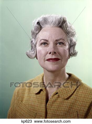 1960 1960S Portrait Elderly Senior Woman Gray Hair Gold Check Top Pleasant Smile Expression Mature Seniors Women Retro View Large Photo Image Stock Image - 1960 1960S Portrait Elderly Senior Woman Gray Hair Gold Check Top Pleasant Smile Expression Mature Seniors Women Retro . Fotosearch