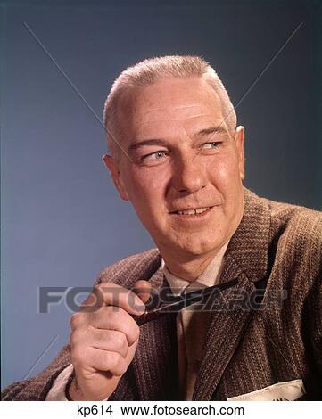 1960 1960S Portrait Senior Man Smiling Holding Pipe View Large Photo Image Picture - 1960 1960S Portrait Senior Man Smiling Holding Pipe . Fotosearch