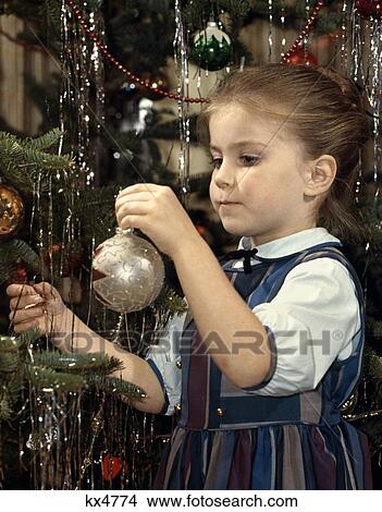 1960 1960S Retro Christmas Girl Ornament Tree Decorate Trim View Large Photo Image Picture - 1960 1960S Retro Christmas Girl Ornament Tree Decorate Trim . Fotosearch