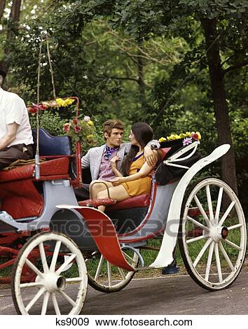 1960 1960S Retro Man Woman Hansom Cab Carriage View Large Photo Image Stock Photo - 1960 1960S Retro Man Woman Hansom Cab Carriage . Fotosearch