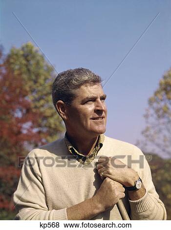1960 1960S Retro Portrait Man Rakeing Leaves Yardwork View Large Photo Image Stock Photo - 1960 1960S Retro Portrait Man Rakeing Leaves Yardwork. Fotosearch