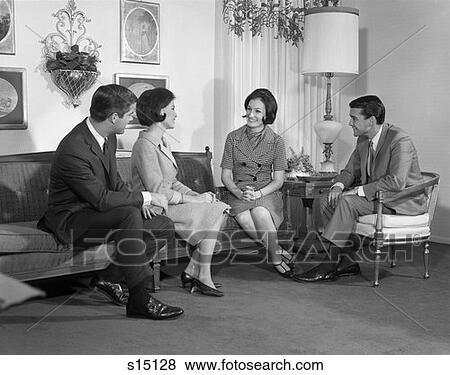 1960 1960S Retro Sofa Couch Sitting Couples View Large Photo Image Stock Photo - 1960 1960S Retro Sofa Couch Sitting Couples . Fotosearch