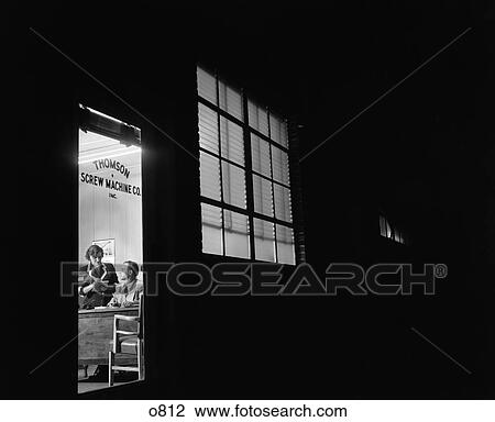 1960 1960S Retro Thomson Screw Machine Desk Man Woman Night Outside Noir View Large Photo Image Stock Image - 1960 1960S Retro Thomson Screw Machine Desk Man Woman Night Outside Noir . Fotosearch