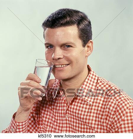 1960 1960S Smiling Man Red Checked Shirt Drinking Glass Water Drink View Large Photo Image Stock Image - 1960 1960S Smiling Man Red Checked Shirt Drinking Glass Water Drink . Fotosearch