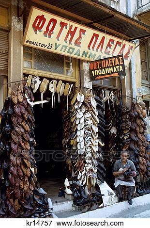 1960S 1960 Athens Shoemaker Cobbler Sit In Front Of Shop Store Pandobosi Street Shoe Shoes Hanging Everywhere Retro View Large Photo Image Stock Photo - 1960S 1960 Athens Shoemaker Cobbler Sit In Front Of Shop Store Pandobosi Street Shoe Shoes Hanging Everywhere Retro. Fotosearch