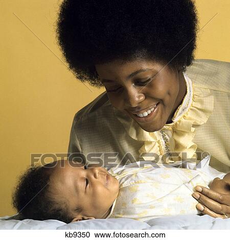 1960S 1970S African-American Mother With Baby View Large Photo Image Stock Image - 1960S 1970S African-American Mother With Baby . Fotosearch