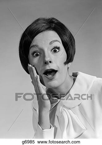 1960S 1970S Brunette Woman Mouth Agape Eyes Wide Hand To Cheek Funny Face Expression Shock Surprise Anger Amazed View Large Photo Image Stock Photography - 1960S 1970S Brunette Woman Mouth Agape Eyes Wide Hand To Cheek Funny Face Expression Shock Surprise Anger Amazed . Fotosearch