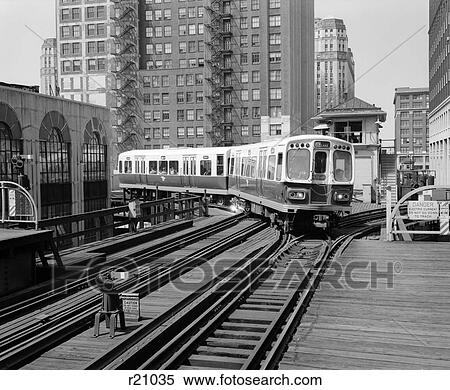 1960S 1970S Chicago Public Transportation El Train Turning Into The Loop On Wells Street View Large Photo Image Stock Photography - 1960S 1970S Chicago Public Transportation El Train Turning Into The Loop On Wells Street . Fotosearch