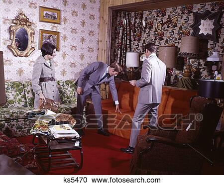 1960S 1970S Couple Man Woman Furniture Store Buy Purchase Couch Sofa Salesman Showroom View Large Photo Image Stock Image - 1960S 1970S Couple Man Woman Furniture Store Buy Purchase Couch Sofa Salesman Showroom. Fotosearch