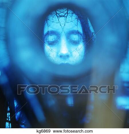 Stock Photo - 1960S 1970S Image Of Woman'S Face Overlapped With Branches Blue Ghostly Image. Fotosearch