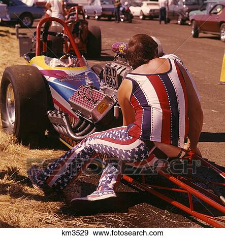 1960S 1970S Man Wearing Patriotic Clothes Working On Engine Of Drag