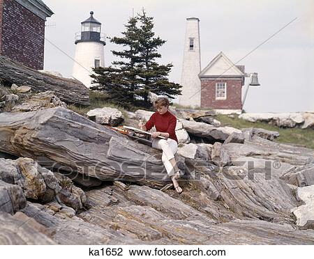 1960S 1970S Retro Artist Painter Woman Painting New Harbor Pemaquid Maine Lighthouse And Rock Formations View Large Photo Image Stock Image - 1960S 1970S Retro Artist Painter Woman Painting New Harbor Pemaquid Maine Lighthouse And Rock Formations. Fotosearch