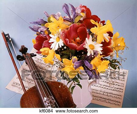 Picture - 1960S 1970S Spring Bouquet Tulips Daisy Daffodil Violin Sheet Music . Fotosearch