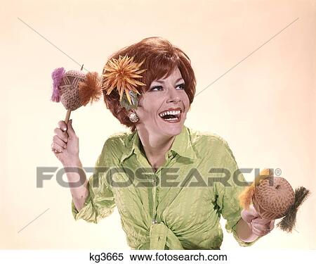 1960S 1970S Woman Dancer Red Hair Caribbean Costume Shaking Coconut Maracas View Large Photo Image Stock Photography - 1960S 1970S Woman Dancer Red Hair Caribbean Costume Shaking Coconut Maracas. Fotosearch