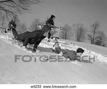 1960S 3 Boys Sled Down Hill Snow Sledding Running Fun Cold Play View Large Photo Image Stock Image - 1960S 3 Boys Sled Down Hill Snow Sledding Running Fun Cold Play . Fotosearch