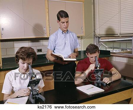 1960S 3 College High School Teen Student Students In Biology Lab Classroom Microscopes Study Retro Vintage View Large Photo Image Stock Photograph - 1960S 3 College High School Teen Student Students In Biology Lab Classroom Microscopes Study Retro Vintage. Fotosearch